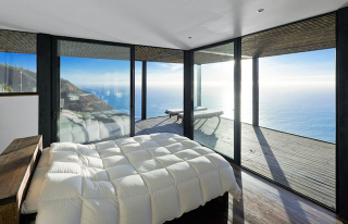 Illustration for article titled Perfect home perched on a cliff is made of dreams of quiet, food and sex